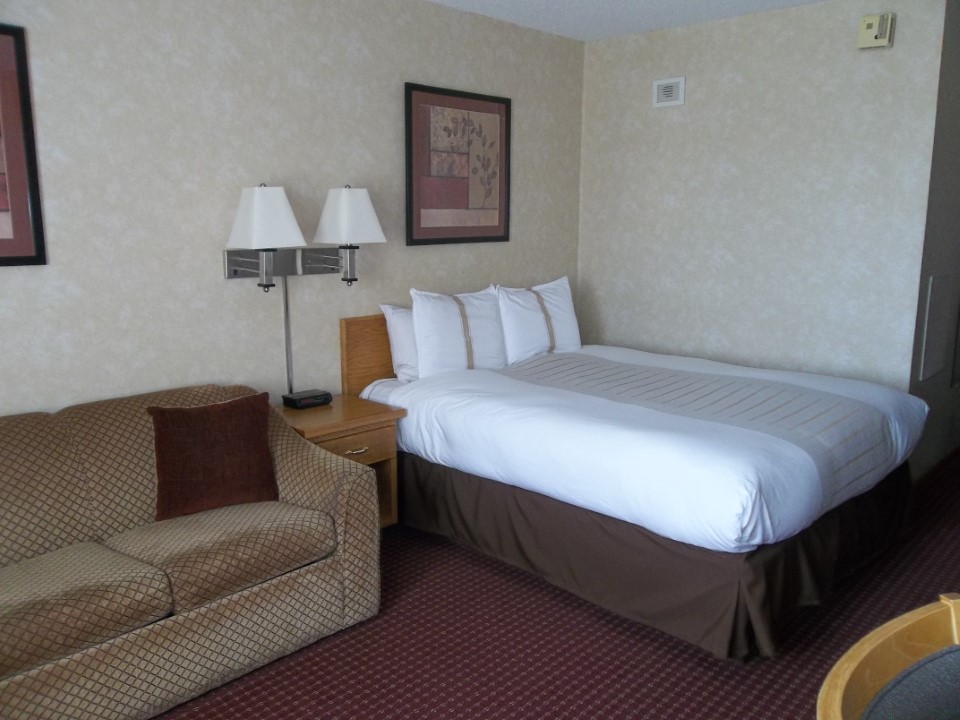 Image of 1 Queen Bed with Sofa Sleeper Room at Fireside Inn Suites in Devils Lake North Dakota